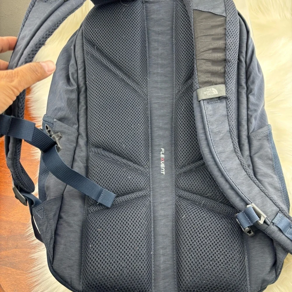 The North Face Blue Backpack with Durable Design and Versatile Functionality